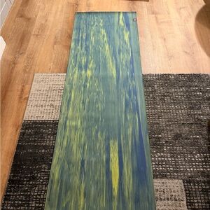 Blue and Yellow Yoga Mat Manduka